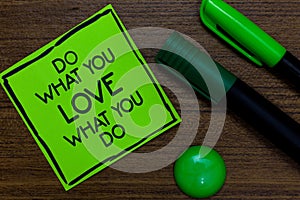 Text sign showing Do What You Love What You Do. Conceptual photo Make things that motivate yourself Passion Written on sticky note
