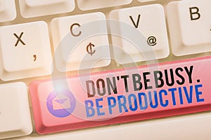 Text sign showing Don T Be Busy Be Productive. Conceptual photo Work efficiently Organize your schedule time White pc