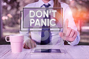 Text sign showing Don T Panic. Conceptual photo to avoid sudden uncontrollable fear or anxiety Keep calm Female business