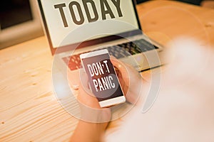 Text sign showing Don T Panic. Conceptual photo to avoid sudden uncontrollable fear or anxiety Keep calm woman laptop