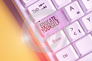 Text sign showing Educate Yourself. Conceptual photo prepare oneself or someone in a particular area or subject White pc