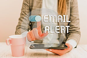 Text sign showing Email Alert. Conceptual photo emails auto generated nd sent to designated recipients Business woman sitting with