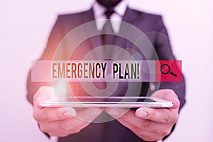 Text sign showing Emergency Plan. Conceptual photo actions developed to mitigate damage of potential events Male human