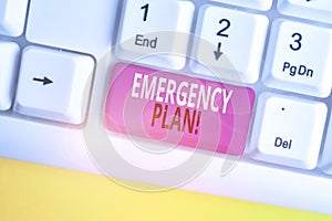 Text sign showing Emergency Plan. Conceptual photo actions developed to mitigate damage of potential events White pc keyboard with