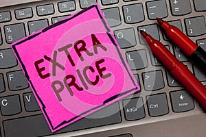 Text sign showing Extra Price. Conceptual photo extra price definition beyond the ordinary large degree Pink paper keyboard Inspir