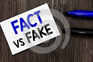 Text sign showing Fact Vs Fake. Conceptual photo Rivalry or products or information originaly made or imitation Important idea ide photo