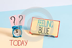 Text sign showing Feeling Blue. Conceptual photo Feeling of desperation because of sadness or missing someone.