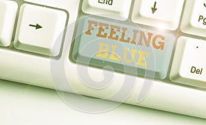 Text sign showing Feeling Blue. Conceptual photo Feeling of desperation because of sadness or missing someone