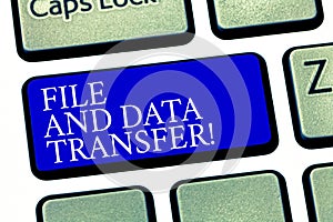 Text sign showing File And Data Transfer. Conceptual photo Transferring information online by the internet Keyboard key