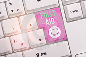 Text sign showing First Aid. Conceptual photo Practise of healing small cuts that no need for medical training White pc