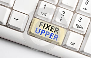 Text sign showing Fixer Upper. Conceptual photo house in need of repairs used chiefly connection with purchase White pc