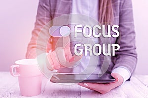Text sign showing Focus Group. Conceptual photo showing assembled to participate in discussion about something Business