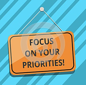 Text sign showing Focus On Your Priorities. Conceptual photo Make a plan based on important things to do Blank Hanging Color Door