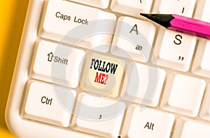 Text sign showing Follow Me Question. Conceptual photo go or come after demonstrating or thing proceeding ahead White pc keyboard