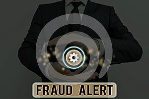 Text sign showing Fraud Alert. Conceptual photo security alert placed on credit card account for stolen identity.