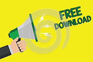 Text sign showing Free Download. Conceptual photo Key in Transfigure Initialize Freebies Wireless Images Man holding megaphone lou
