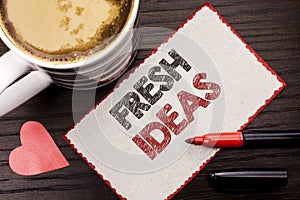 Text sign showing Fresh Ideas. Conceptual photo Creative Vision Thinking Imagination Concept Strategy written on Sticky Note on t