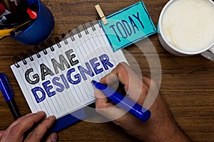 Text sign showing Game Designer. Conceptual photo Campaigner Pixel Scripting Programmers Consoles 3D Graphics Man holding marker n