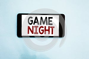 Text sign showing Game Night. Conceptual photo event in which folks get together for the purpose of getting laid Cell phone white