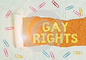 Text sign showing Gay Rights. Conceptual photo equal civil and social rights for homosexuals individuals Paper clip and