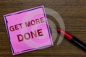 Text sign showing Get More Done. Conceptual photo Checklist Organized Time Management Start Hardwork Act Purple Paper photo