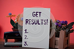 Text sign showing Get Results. Conceptual photo caused or produced by something else Consequence outcome Flowers and