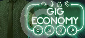 Text sign showing Gig Economy. Business overview a market system distinguished by shortterm jobs and contracts