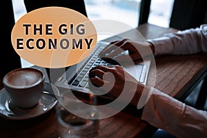 Text sign showing The Gig Economy. Concept meaning Market of Short-term contracts freelance work temporary