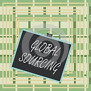 Text sign showing Global Sourcing. Conceptual photo practice of sourcing from the global market for goods Stamp stuck binder clip photo