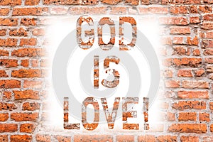 Text sign showing God Is Love. Conceptual photo Believing in Jesus having faith religious thoughts Christianity Brick