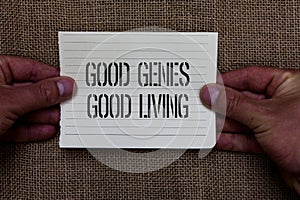 Text sign showing Good Genes Good Living. Conceptual photo Inherited Genetic results in Longevity Healthy Life Man holding piece n photo