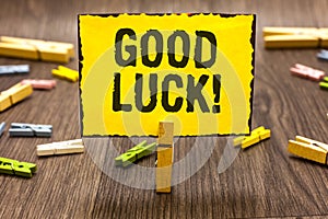 Text sign showing Good Luck. Conceptual photo A positive fortune or a happy outcome that a person can have Clothespin holding yell