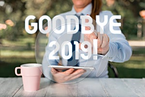 Text sign showing Goodbye 2019. Conceptual photo express good wishes when parting or at the end of last year Female