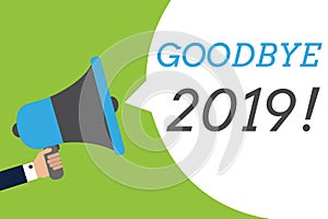 Text sign showing Goodbye 2019. Conceptual photo New Year Eve Milestone Last Month Celebration Transition Man holding photo