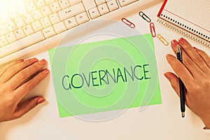 Text sign showing Governance. Business overview exercised in handling an economic situation in a nation Notebook With