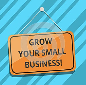 Text sign showing Grow Your Small Business. Conceptual photo company generates positive cash flow Earn Blank Hanging Color Door