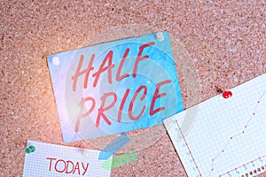 Text sign showing Half Price. Conceptual photo half the usual price at which something is offered for sale Corkboard