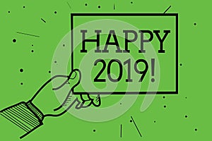 Text sign showing Happy 2019. Conceptual photo time or day at which a new calendar year begin from now Man hand holding paper comm