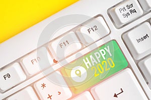 Text sign showing Happy 2020. Conceptual photo time or day at which a new calendar year begin from now White pc keyboard