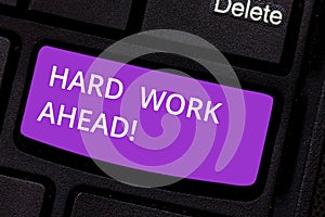 Text sign showing Hard Work Ahead. Conceptual photo A lot of job expected big challenge activities required Keyboard key