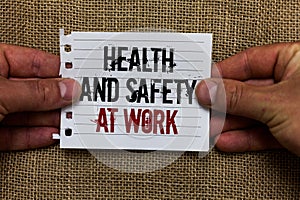 Text sign showing Health And Safety At Work. Conceptual photo Secure procedures prevent accidents avoid danger Man holding piece n