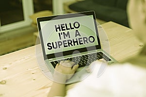 Text sign showing Hello I M A Superhero. Conceptual photo Believing in yourself Selfconfidence Introduction woman laptop