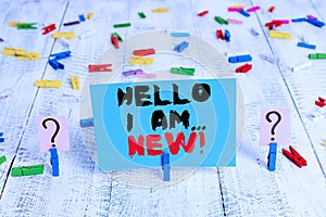 Text sign showing Hello I Am New. Conceptual photo introducing oneself in a group as fresh worker or student Scribbled and