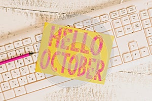 Text sign showing Hello October. Conceptual photo Last Quarter Tenth Month 30days Season Greeting White keyboard office