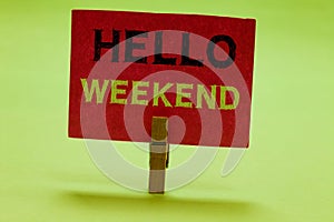 Text sign showing Hello Weekend. Conceptual photo Getaway Adventure Friday Positivity Relaxation Invitation Clothespin holding red