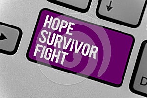 Text sign showing Hope Survivor Fight. Conceptual photo stand against your illness be fighter stick to dreams Keyboard key office