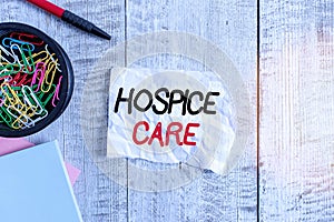 Text sign showing Hospice Care. Conceptual photo focuses on the palliation of a chronically ill patients Wrinkle paper and photo