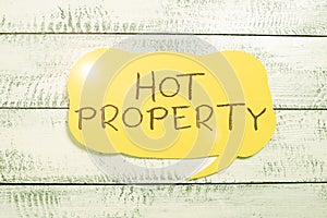 Text sign showing Hot Property. Business approach Something which is sought after or is Heavily Demanded