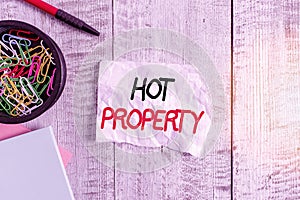 Text sign showing Hot Property. Conceptual photo one that many showing want to buy and it is highly desirable Wrinkle paper and