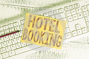 Text sign showing Hotel Booking. Conceptual photo Online Reservations Presidential Suite De Luxe Hospitality White keyboard office photo